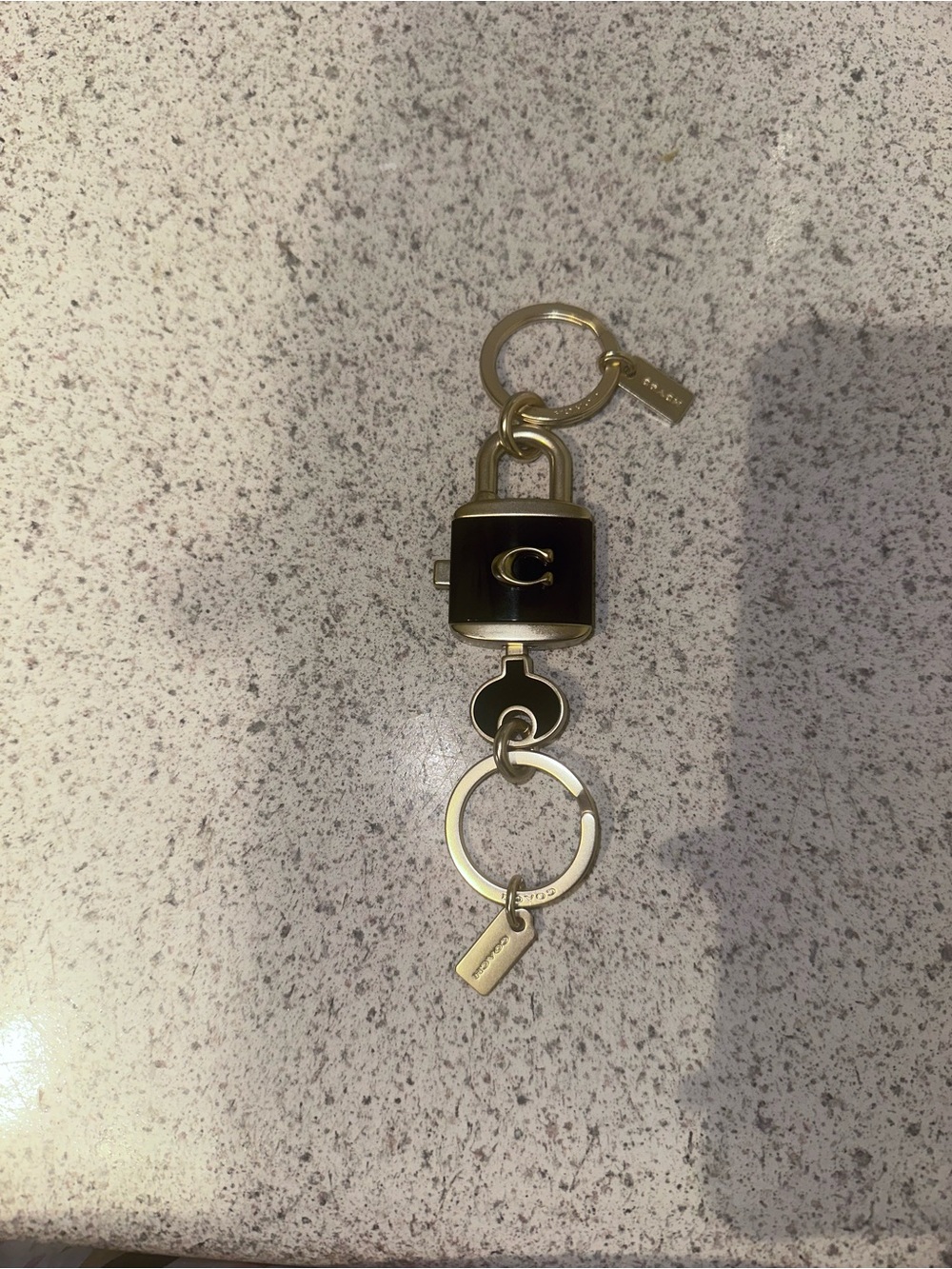 Coach Gold and Black Padlock Keychain with Tag